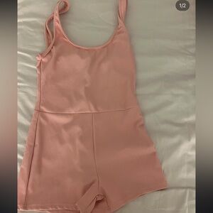 edkited pink tight romper.